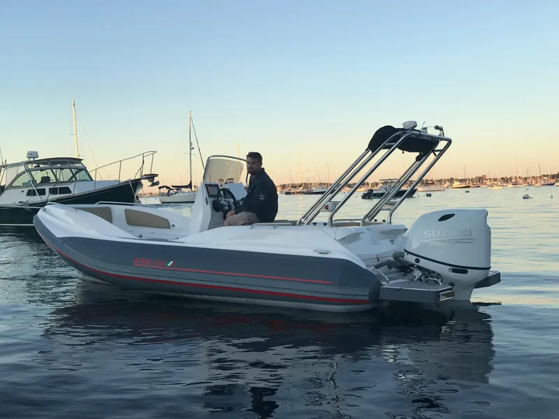 Slide: The Image of 2022 Zar Formenti 59 SL boat on calm water at sunset. - 21