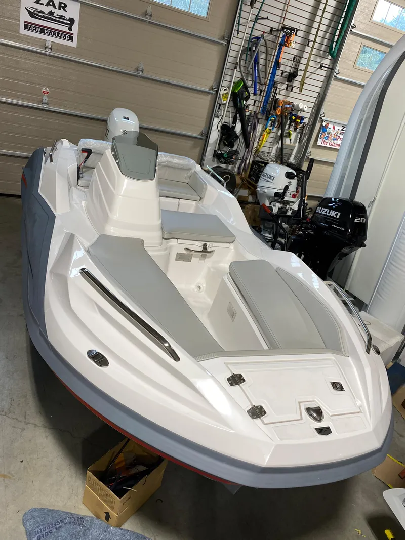 Slide: The Image of 2023 Zar Formenti Tender ZF-3 in a garage, showcasing sleek design and modern features. - 2