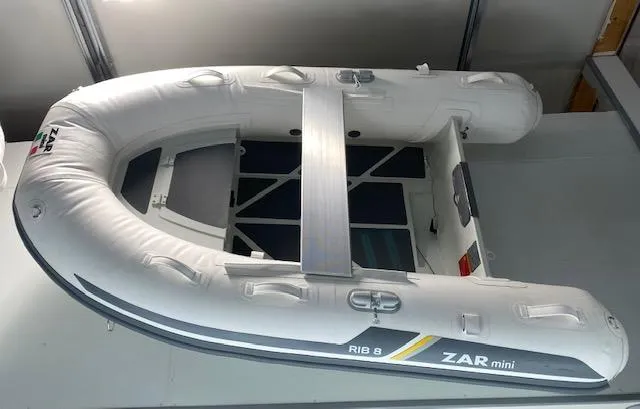 The Image of 2022 ZAR Mini RIB 8 HDL inflatable boat in a showroom. - 0