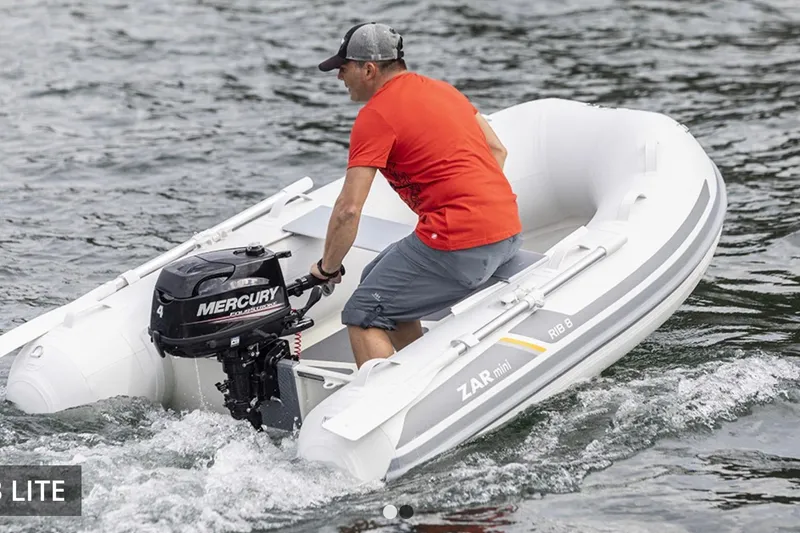 Slide: The Image of Man operating 2022 ZAR Mini RIB 8 HDL inflatable boat with Mercury outboard motor. - 5