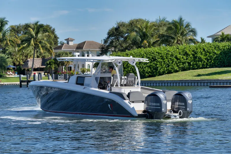 Slide: The Image of 2016 Powerplay Powerboats 42 cruising on a sunny day with twin Yamaha engines. - 10