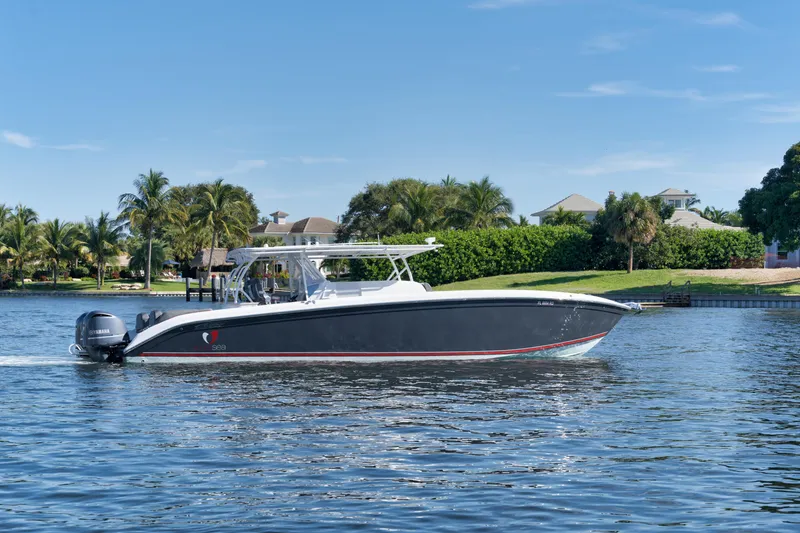 Slide: The Image of 2016 Powerplay Powerboats 42 model cruising on a sunny day. - 2