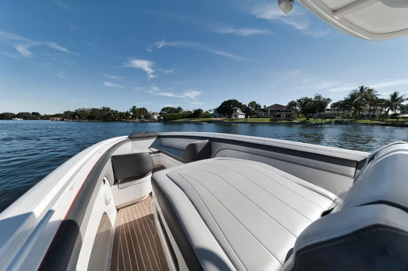 Slide: The Image of 2016 Powerplay Powerboats 42 on a serene lake with luxurious seating. - 20
