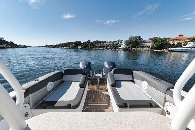 Slide: The Image of 2016 Powerplay Powerboats 42 model on a serene waterfront. - 29