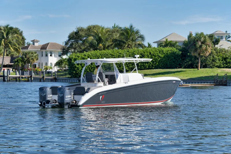 Slide: The Image of 2016 Powerplay Powerboats 42 model cruising on a scenic waterway. - 3