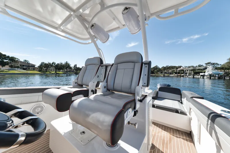 Slide: The Image of 2016 Powerplay Powerboats 42 model, luxury seating, waterfront view. - 31