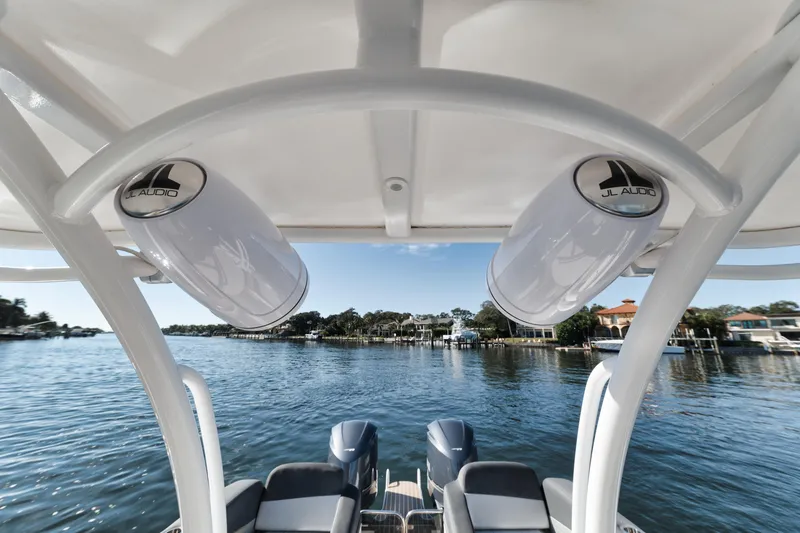 Slide: The Image of 2016 Powerplay Powerboats 42 model, rear view with dual engines and JL Audio speakers. - 32