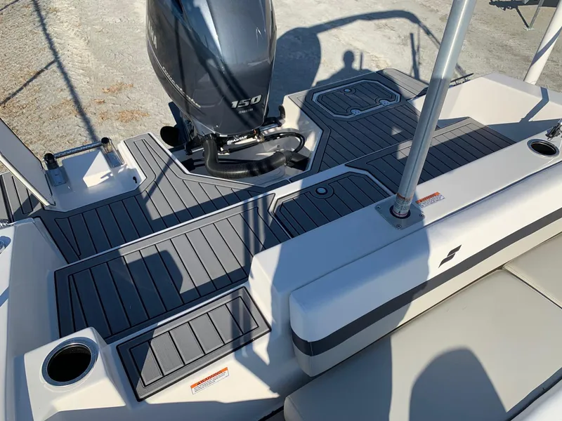 Slide: The Image of 2024 Starcraft SVX 211 boat with a 150 HP outboard motor. - 5