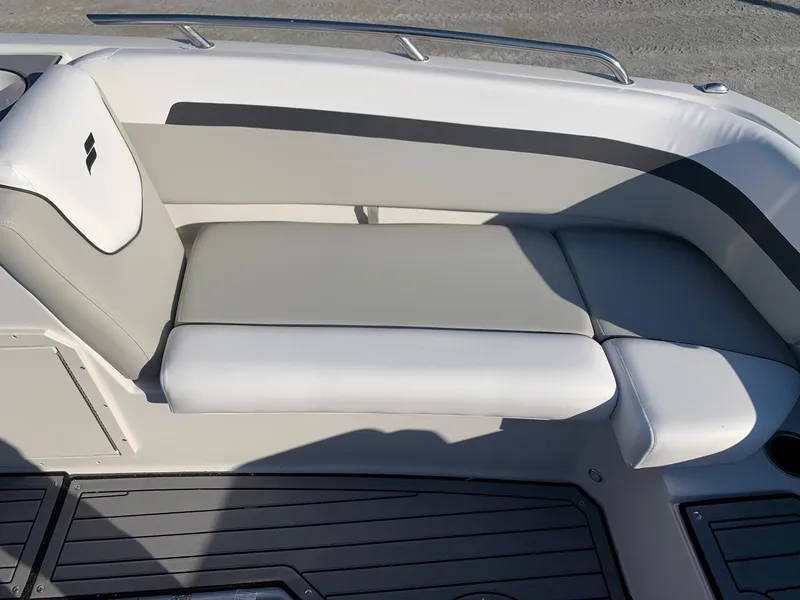 Slide: The Image of 2024 Starcraft SVX 211 boat interior seating with gray and white upholstery. - 7