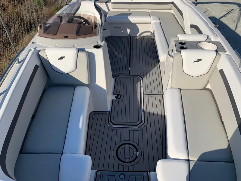 Slide: The Image of 2024 Starcraft SVX 211 boat interior with spacious seating and modern design. - 8