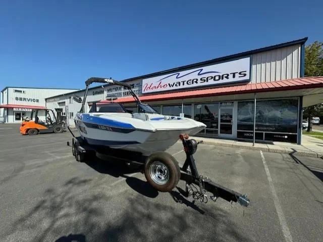 Slide: The Image of 2020 Axis A20 boat on trailer at Idaho Water Sports dealership. - 4