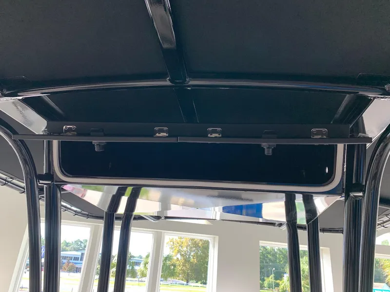 Slide: The Image of 2024 Robalo R202 Explorer boat interior roof structure. - 14