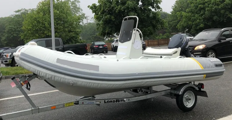 Slide: The Image of 2022 ZAR Mini RIB 14 HDL inflatable boat on a Load Rite trailer. - 3