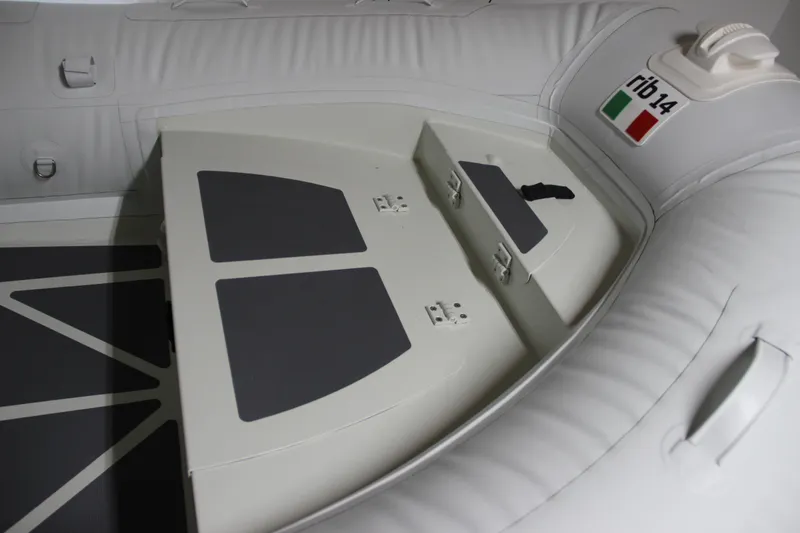 Slide: The Image of 2022 ZAR Mini RIB 14 HDL inflatable boat interior with storage compartments. - 5