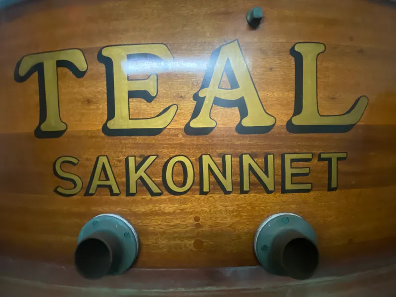 Slide: The Image of "Teal Sakonnet" nameplate on vintage 1960 Classic Riverside Boat Co. vessel. - 10