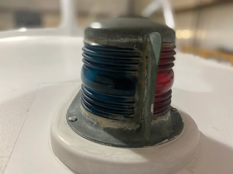 Slide: The Image of 1960 Classic Riverside Boat Co. navigation light with red and blue lenses. - 29