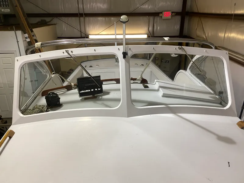 Slide: The Image of 1960 Classic Riverside Boat Co. interior with vintage dashboard and navigation equipment. - 30