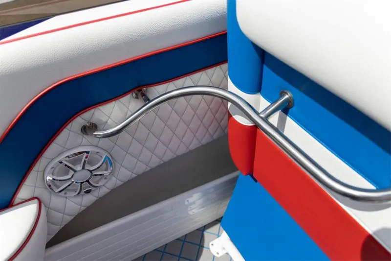Slide: The Image of Interior detail of 2024 Velocity 260VR boat with red, white, and blue upholstery. - 12