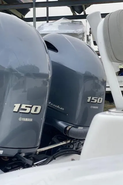 Slide: The Image of 2020 Cape Horn 24 XS boat with twin Yamaha 150 outboard engines. - 14