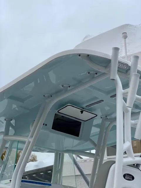 Slide: The Image of 2020 Cape Horn 24 XS boat with a sturdy T-top and integrated electronics. - 5