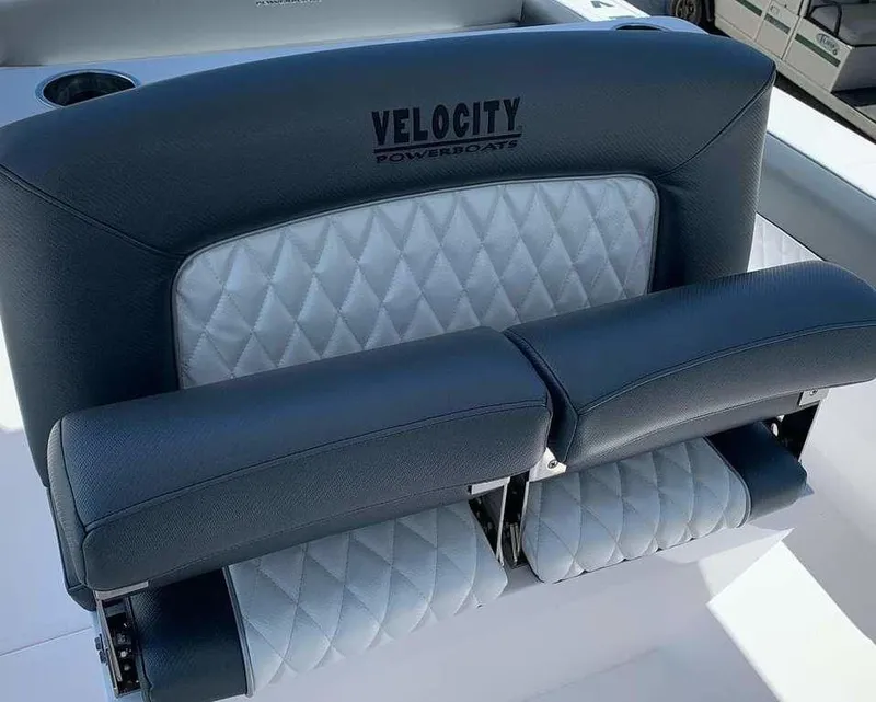 Slide: The Image of 2024 Velocity 262 CC boat seat with diamond-stitched upholstery. - 9