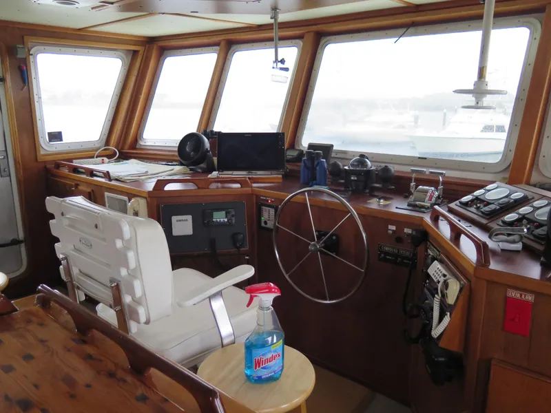 Slide: The Image of 1998 Rodriquez Custom boat interior with navigation equipment and captain's chair. - 8