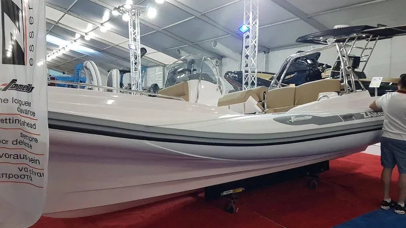 Slide: The Image of 2023 Zar Formenti Zar 65 boat interior with tan seating and sleek design. - 7