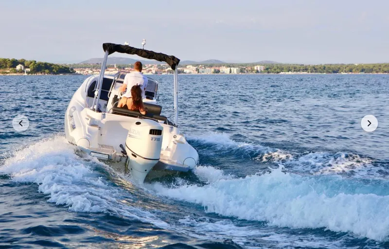 Slide: The Image of 2023 Zar Formenti Zar 65 boat cruising on open water. - 8