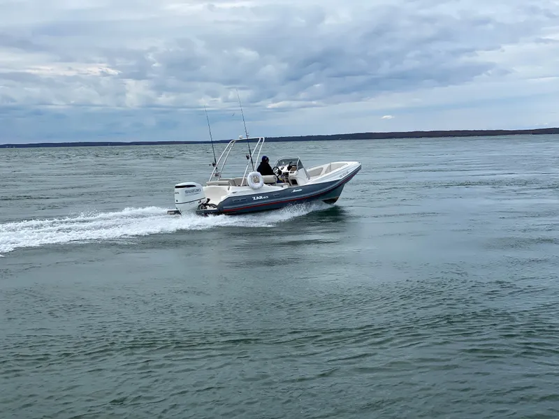 Slide: The Image of 2023 Zar Formenti Zar 65 boat cruising on open water. - 9