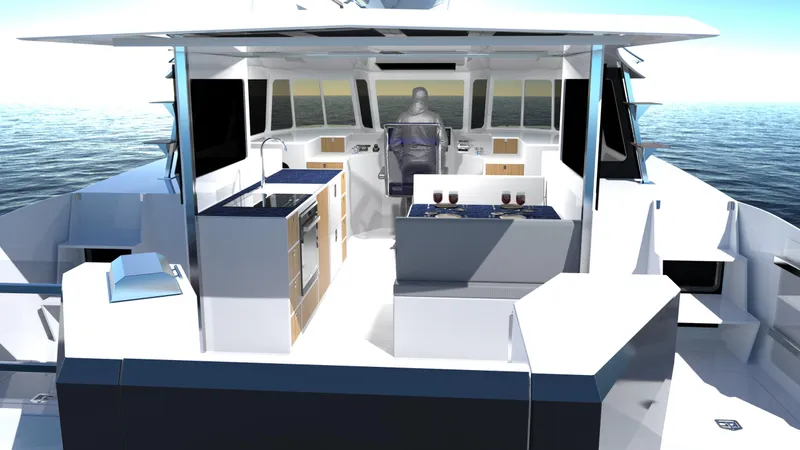 Slide: The Image of 2025 Razor Cat 38 Power Cat interior with modern kitchen and seating on open water. - 11