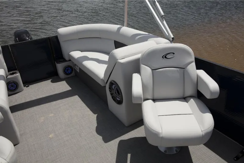 Slide: The Image of 2023 Crest Classic LX boat interior with white leather seating. - 15