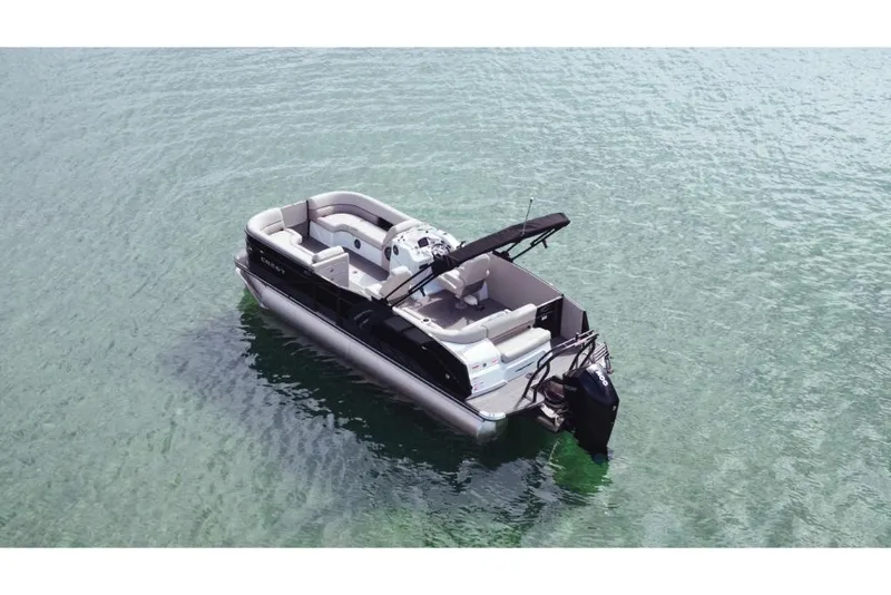Slide: The Image of 2023 Crest Caribbean Platinum pontoon boat on clear water. - 3