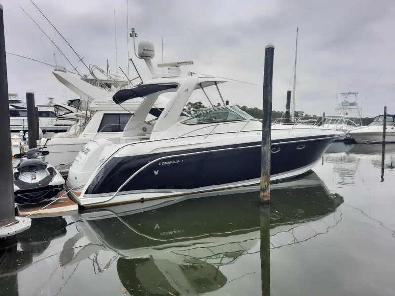 Slide: The Image of 2008 Formula 40 PC yacht docked at marina. - 1