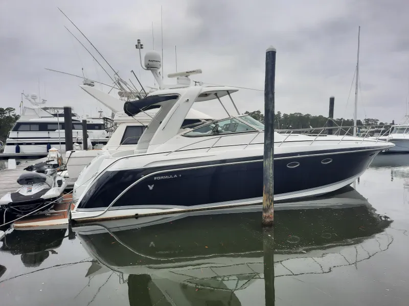 Slide: The Image of 2008 Formula 40 PC yacht docked at marina. - 2