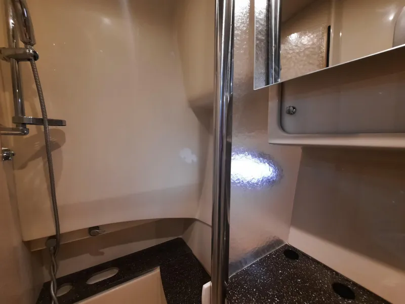 Slide: The Image of Bathroom interior of a 2008 Formula 40 PC yacht with shower and mirror. - 26