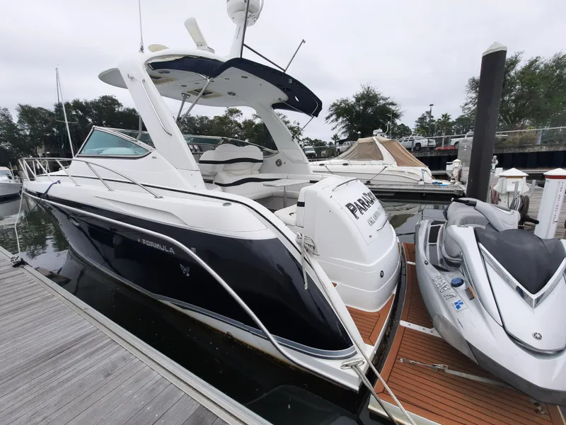 Slide: The Image of 2008 Formula 40 PC yacht docked beside a jet ski. - 3