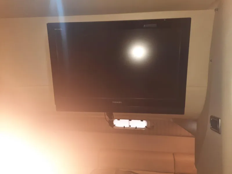 Slide: The Image of Flat-screen TV in the cabin of a 2008 Formula 40 PC boat. - 35