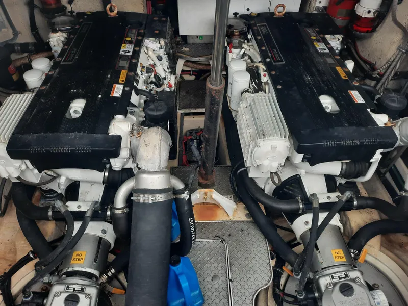 Slide: The Image of 2008 Formula 40 PC engine room with dual engines and mechanical components. - 36