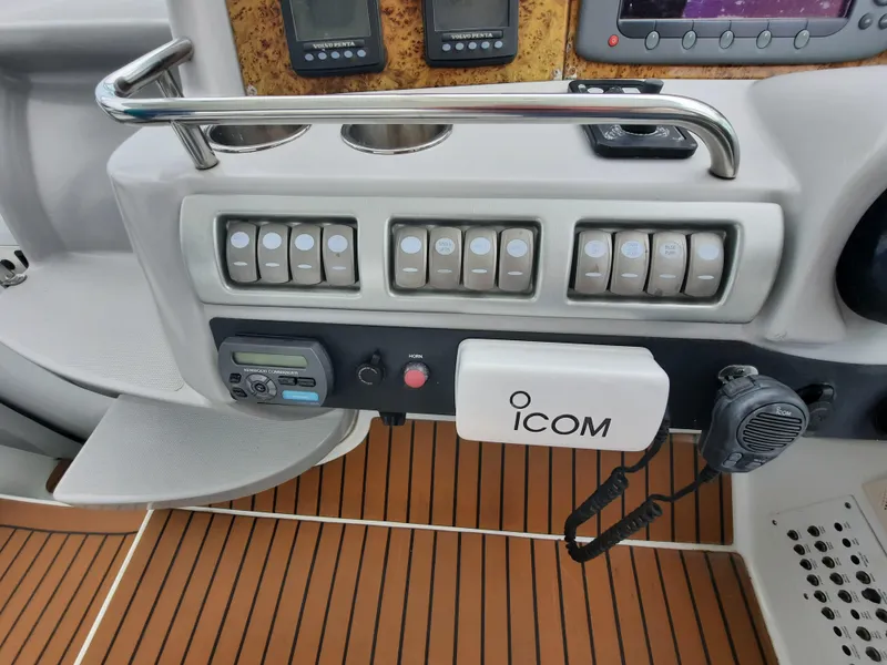 Slide: The Image of Control panel of a 2008 Formula 40 PC boat with ICOM radio. - 5