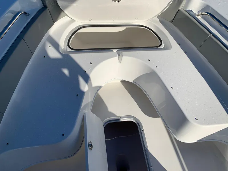 Slide: The Image of 2024 Cape Horn 24 XS boat interior with storage compartments. - 15
