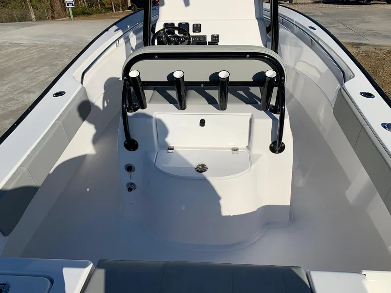 Slide: The Image of 2024 Cape Horn 24 XS boat interior with rod holders and seating. - 5