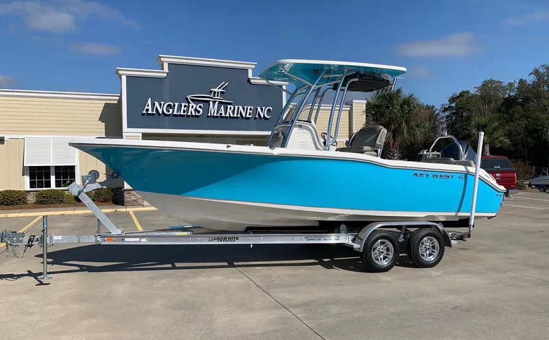 The Image of 2024 Key West 239 FS boat on trailer at Anglers Marine NC dealership. - 0