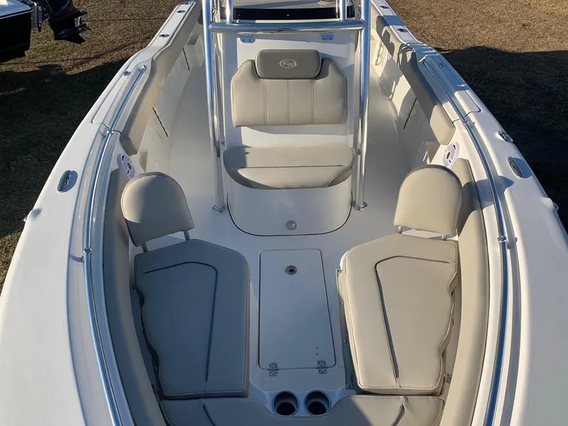 Slide: The Image of 2026 Key West 239 FS boat interior with cushioned seating and sleek design. - 18