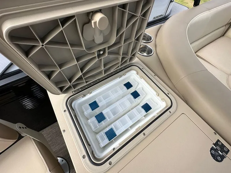 Slide: The Image of Storage compartment of 2022 Manitou 20 Aurora LE Angler Full Front Twin Tube boat. - 17