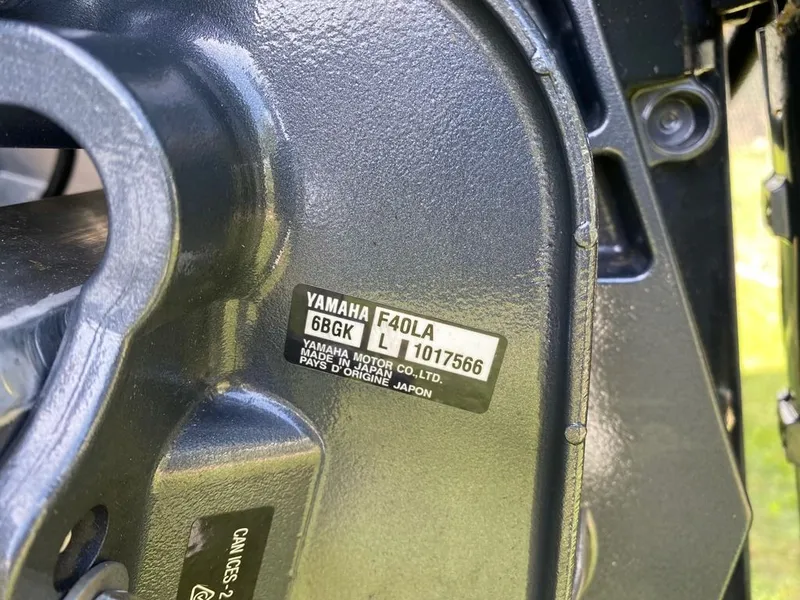 Slide: The Image of Close-up of Yamaha F40LA engine on 2022 Manitou 18 Aurora LE Twin Tube 25. - 22