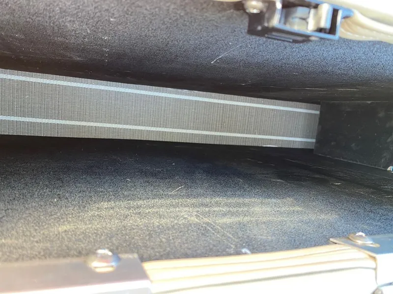 Slide: The Image of Interior storage compartment of a 2022 Manitou 23 Oasis SR VP boat. - 24