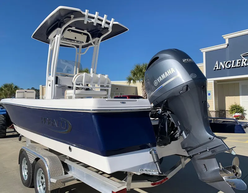 Slide: The Image of 2024 Robalo 226 Cayman boat with Yamaha 200 engine at Angler's Marine. - 2