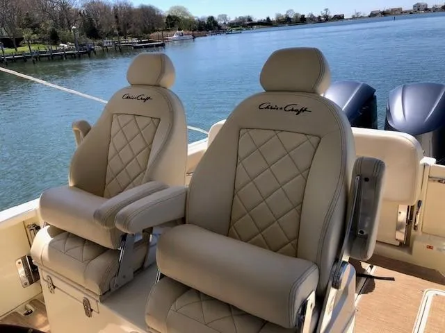 Slide: The Image of Luxury seating on 2021 Chris-Craft Catalina 30 boat with scenic water view. - 11