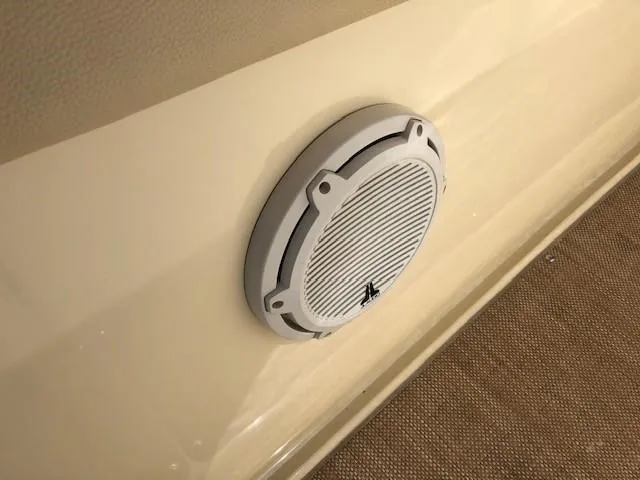 Slide: The Image of Chris-Craft Catalina 30 2021 boat speaker on beige interior wall. - 13