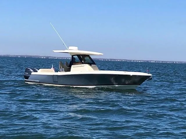 Slide: The Image of 2021 Chris-Craft Catalina 30 boat cruising on open water. - 5